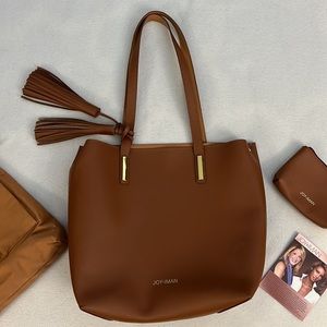Joy and Iman Tan genuine leather tote and wristlet. 11x11x4 Wristlet is 4x6x1.